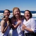 Becca, Hana and Hannah smile after jumping into Arctic Ocean.